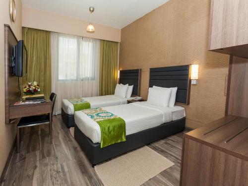 Oasis Deira Hotel Дубай Экстерьер фото
