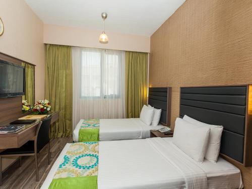 Oasis Deira Hotel Дубай Экстерьер фото